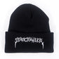 A black cuffed Turbo Acrylic beanie by Starcrawler, featuring "Starcrawler" embroidered in spiky white lettering on the front.