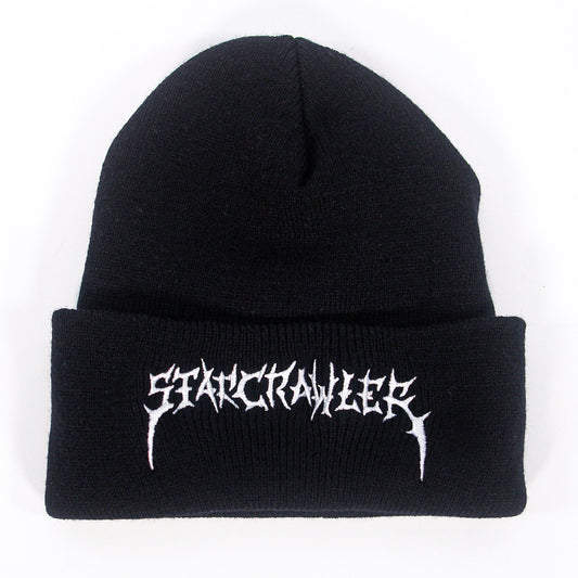 A black cuffed Turbo Acrylic beanie by Starcrawler, featuring "Starcrawler" embroidered in spiky white lettering on the front.