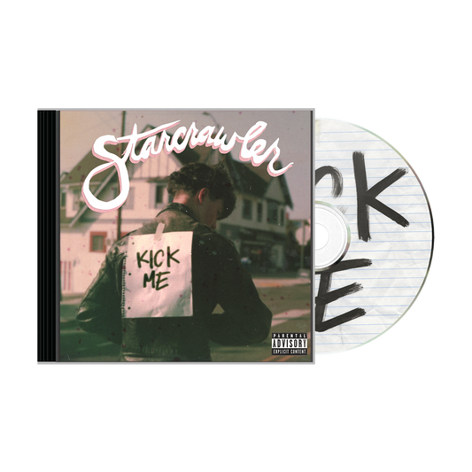Starcrawler album cover featuring a person in a leather jacket with a Kick Me sign taped to their back, alongside the disc showing the word KICK on a lined paper tracklisting background.